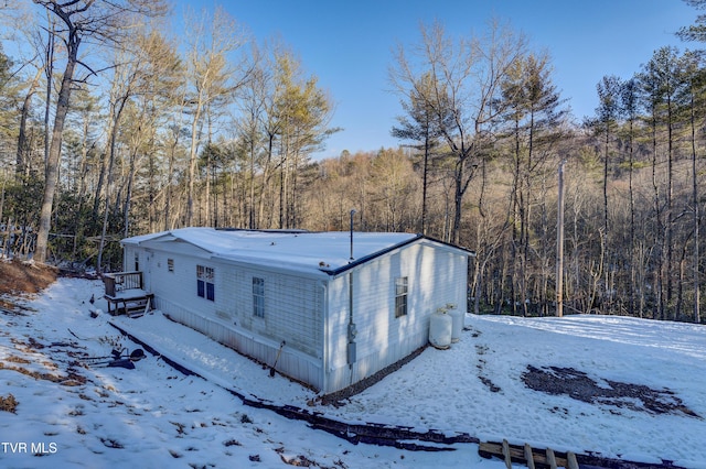 view of snow covered property