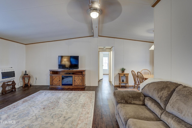 living room with dark hardwood / wood-style floors, heating unit, vaulted ceiling with beams, and ceiling fan