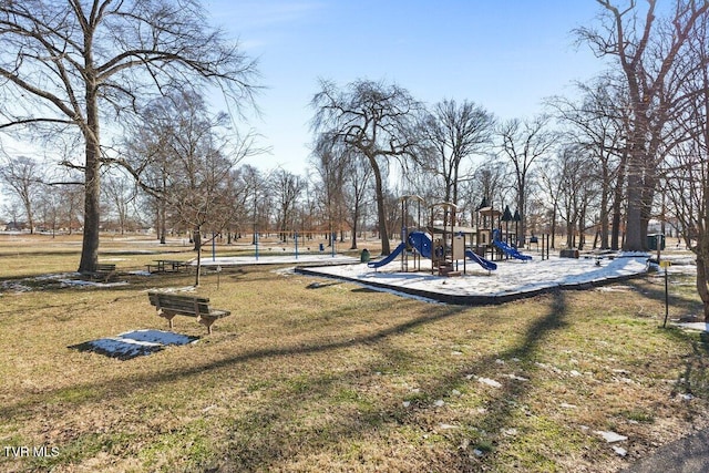 view of jungle gym featuring a lawn