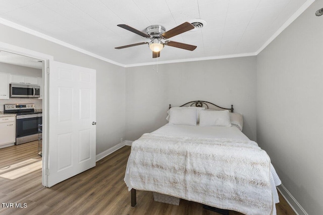 bedroom with ceiling fan, dark hardwood / wood-style floors, and crown molding