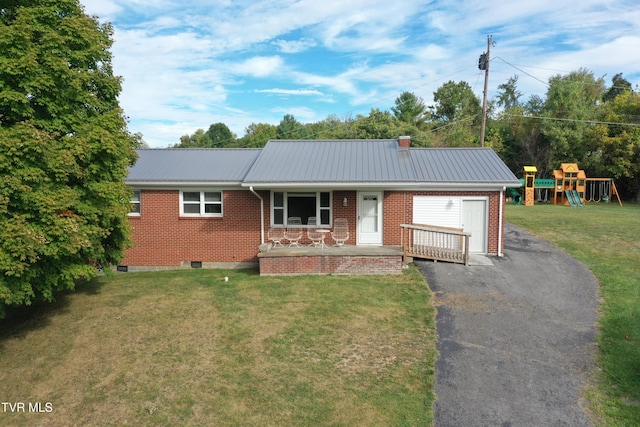 single story home with a playground, a front lawn, and covered porch