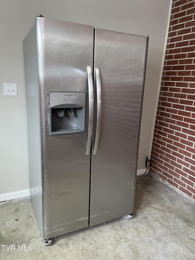 details featuring stainless steel refrigerator with ice dispenser