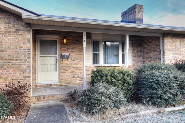 entrance to property with a porch