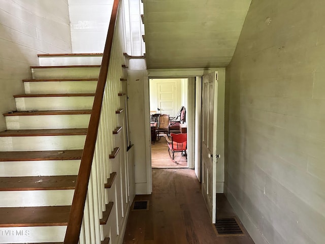 stairway featuring hardwood / wood-style flooring