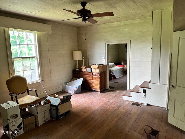 miscellaneous room featuring hardwood / wood-style flooring, ceiling fan, and wood ceiling