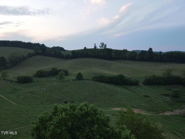 exterior space with a rural view