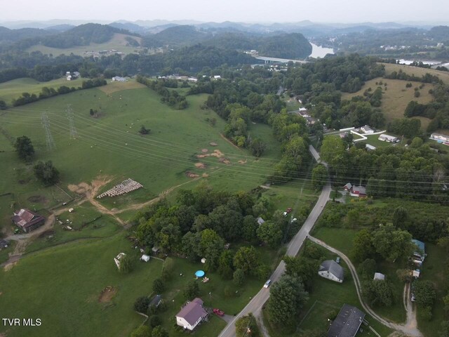 birds eye view of property featuring a rural view