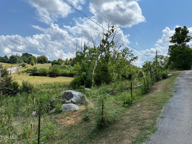 view of landscape with a rural view