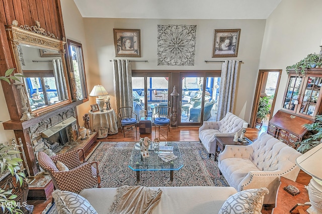 living room featuring hardwood / wood-style flooring and a fireplace