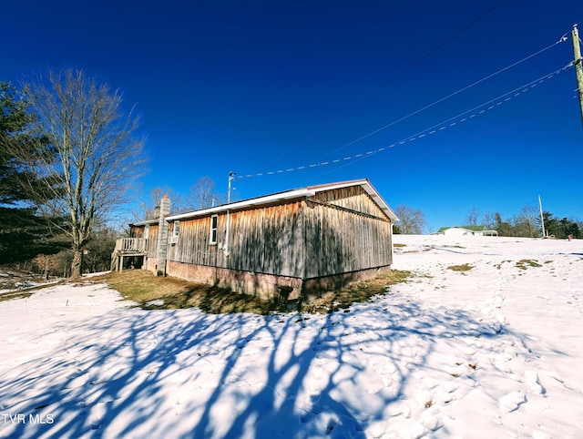 view of snow covered property