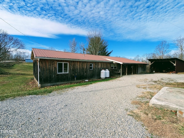 exterior space with a carport