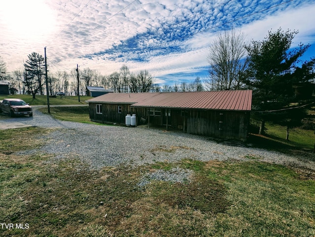 exterior space with a yard