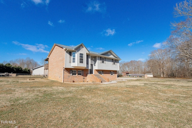 view of front of property with a front lawn