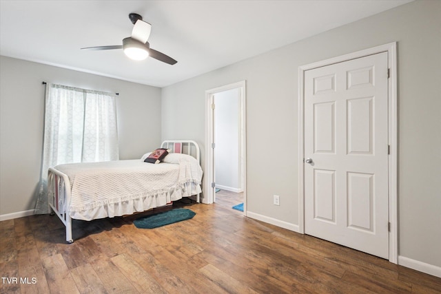 bedroom featuring ceiling fan and wood-type flooring