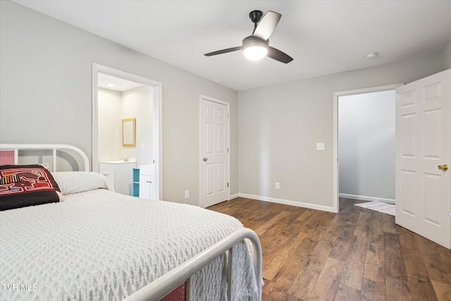 bedroom with ceiling fan, dark wood-type flooring, and connected bathroom