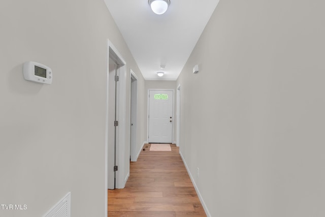 hall featuring light hardwood / wood-style flooring