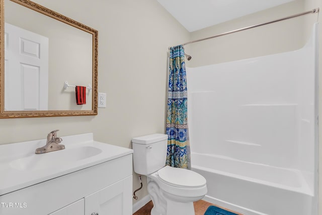 full bathroom featuring toilet, shower / bath combination with curtain, and vanity