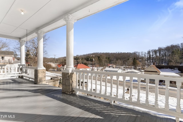 view of snow covered deck