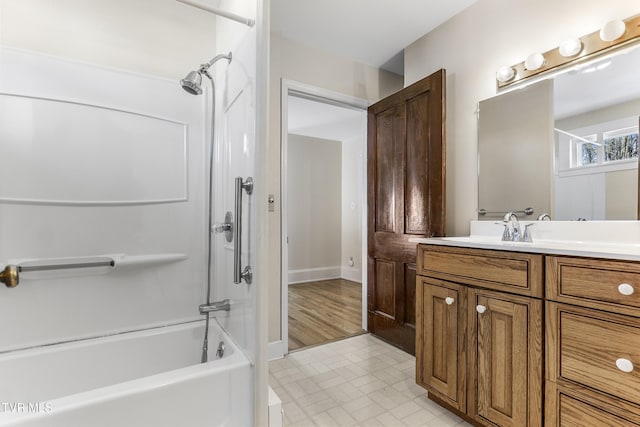 bathroom with vanity and bathing tub / shower combination