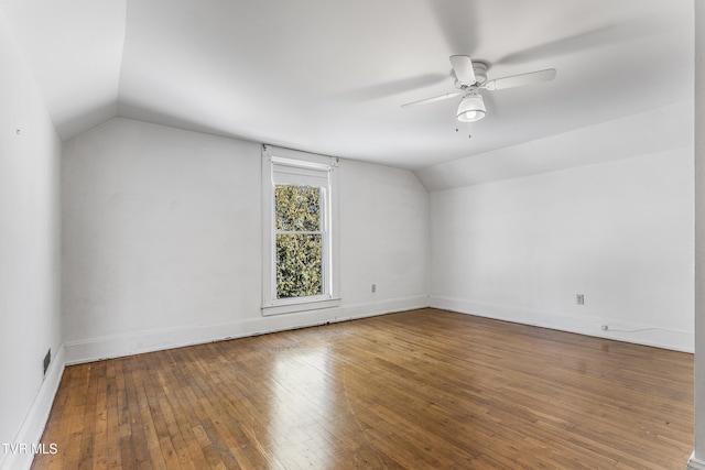 bonus room with vaulted ceiling, ceiling fan, and hardwood / wood-style flooring