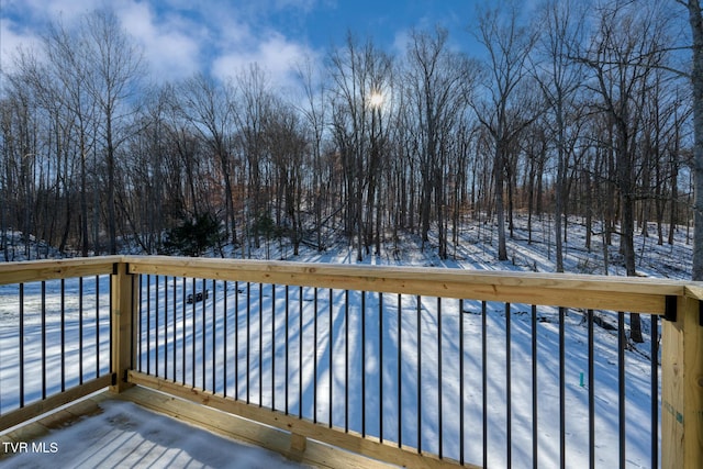 view of snow covered deck