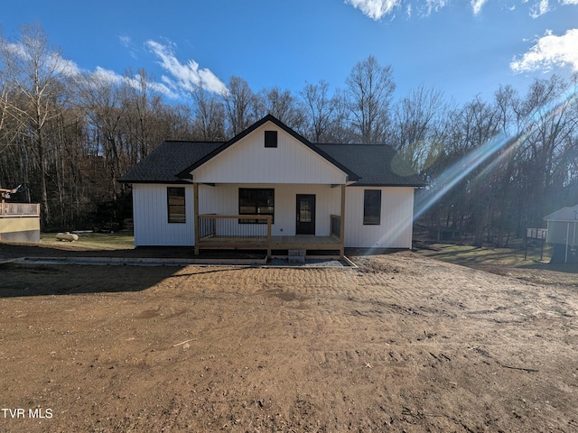 modern inspired farmhouse with covered porch