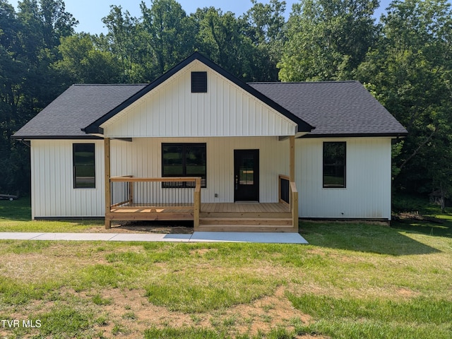 1430 E Cedar St, Bristol, TN 37620 - view of front of property featuring a shingled roof, a front yard, and a porch