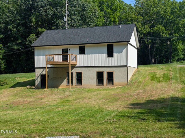 1430 E Cedar St, Bristol, TN 37620 - rear view of property with a yard, a wooden deck, and roof with shingles