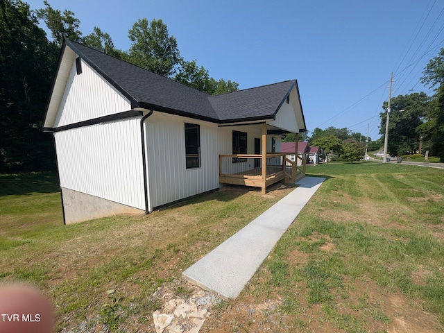 1430 E Cedar St, Bristol, TN 37620 - view of property exterior with a deck and a yard