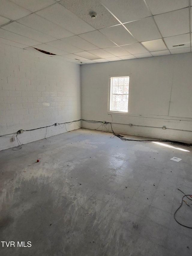 interior space featuring a paneled ceiling