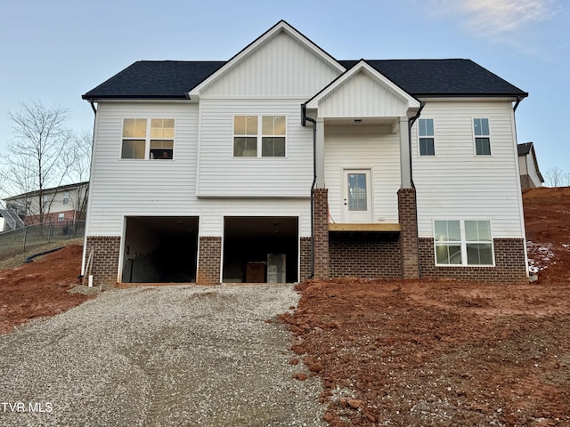 raised ranch featuring a garage