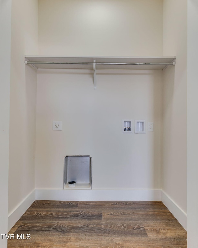 clothes washing area featuring dark wood-style floors, hookup for an electric dryer, hookup for a washing machine, and laundry area