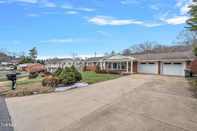 single story home with a garage and a front yard