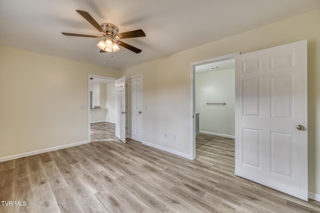 unfurnished bedroom featuring ceiling fan and light hardwood / wood-style flooring