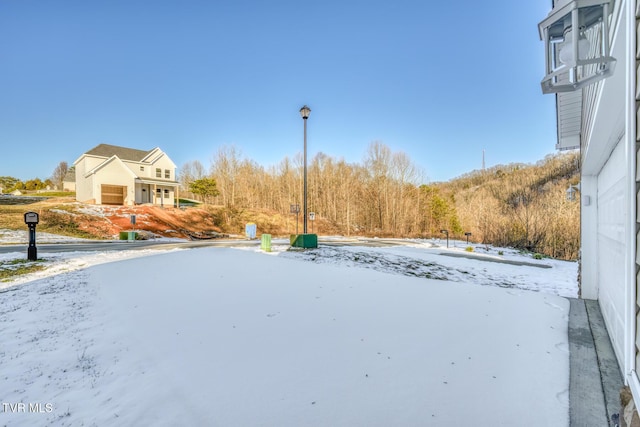 view of yard featuring a garage