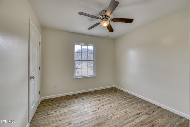 unfurnished room featuring light wood-type flooring and ceiling fan