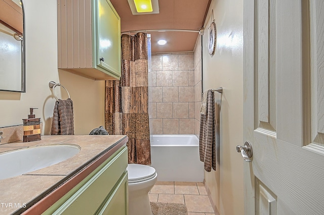 full bathroom featuring vanity, shower / tub combo, tile patterned floors, and toilet