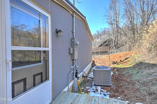 view of home's exterior with central AC unit