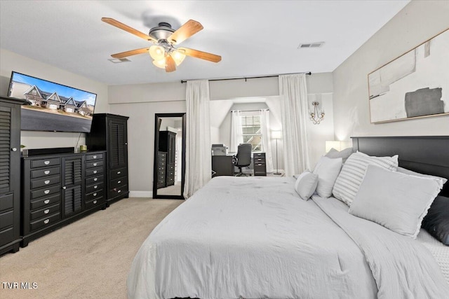 bedroom with ceiling fan and light carpet