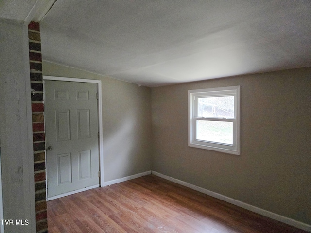 empty room featuring hardwood / wood-style floors