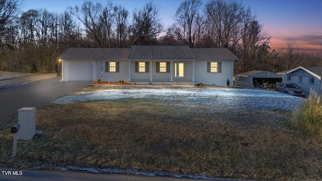 view of front of house with a garage