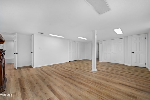 basement with light wood-type flooring