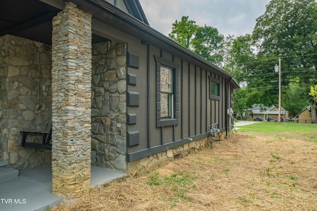 view of property exterior featuring a yard