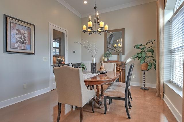 dining room with concrete flooring, a chandelier, and ornamental molding