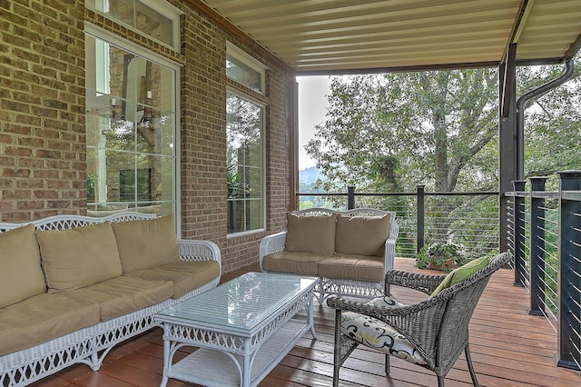 wooden deck with an outdoor hangout area