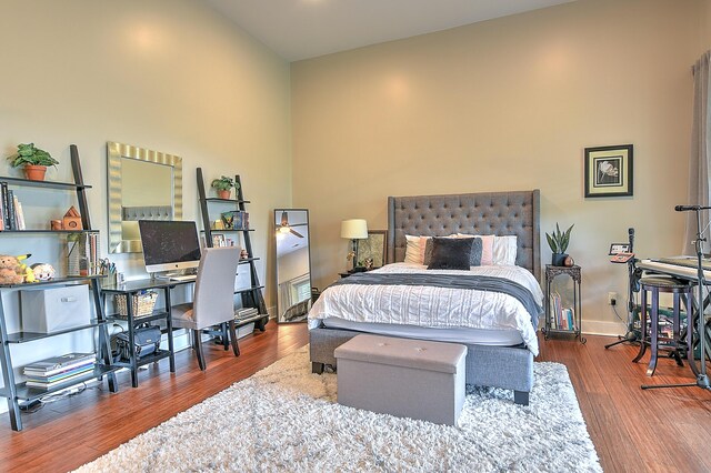 bedroom featuring hardwood / wood-style floors