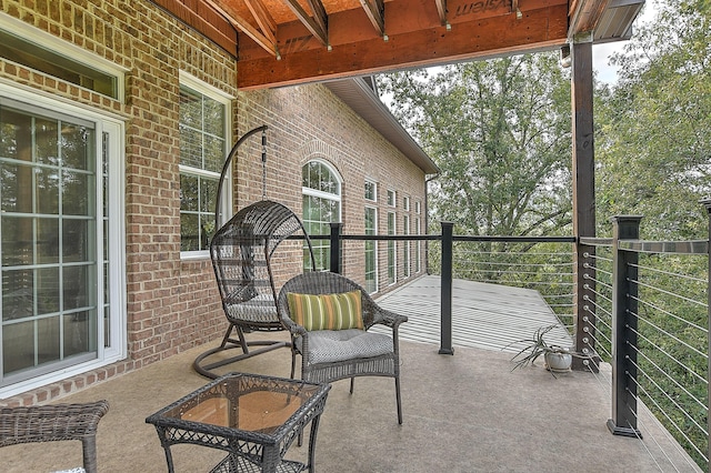 view of patio / terrace with a balcony