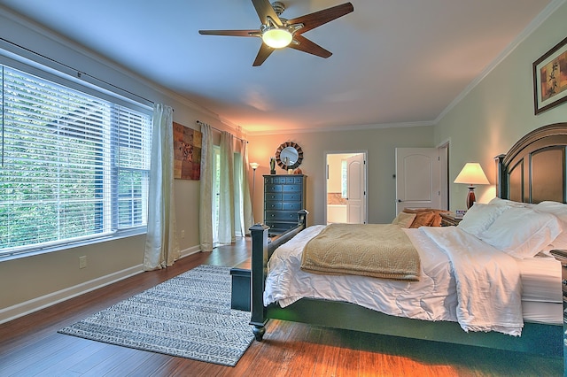 bedroom featuring ensuite bathroom, ceiling fan, ornamental molding, and hardwood / wood-style flooring