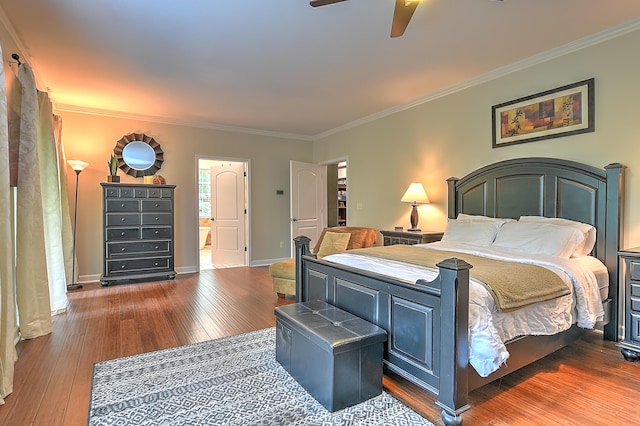 bedroom featuring ceiling fan, dark hardwood / wood-style floors, and ornamental molding