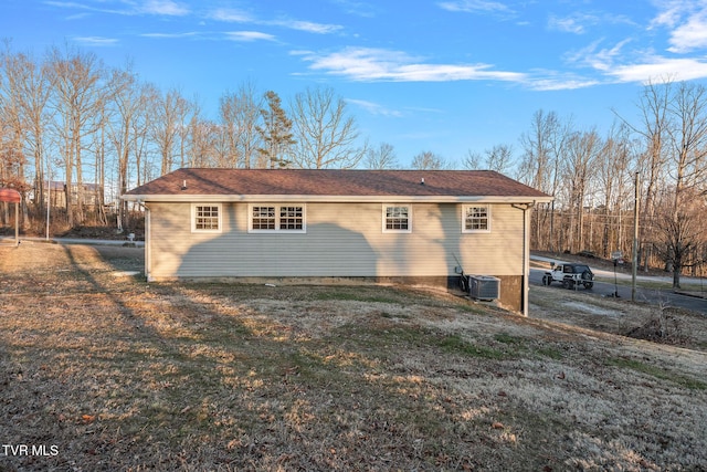 view of home's exterior with a yard